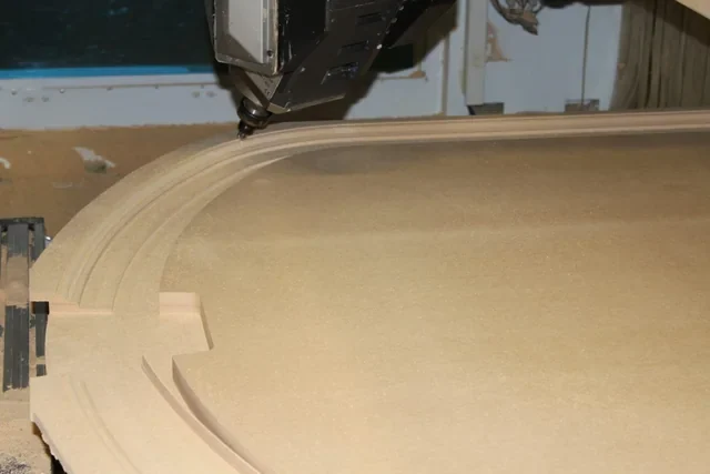 One-piece MDF door trim with a basket-handle arch