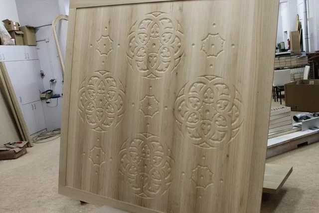 Engraving and V-carving on a sliding door panel