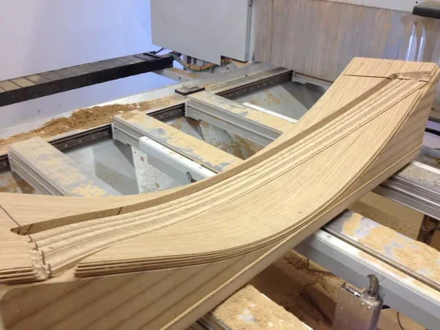 Machining a tapered profile on a concave surface