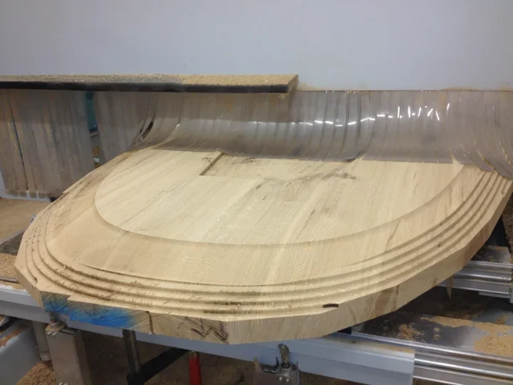 Three-dimensional machining of an oval tabletop