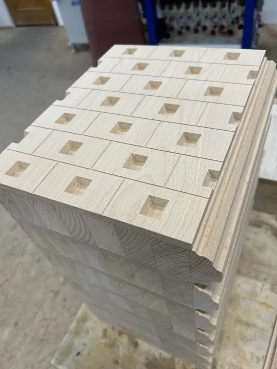 Repeated milled features in a book-shaped workpiece